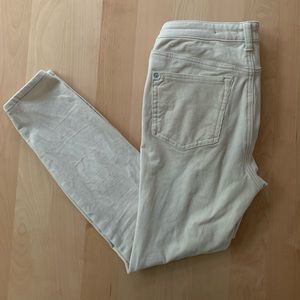 Pilcro cream, button fly, high waist skinny leg corduroy pants. Size 27.